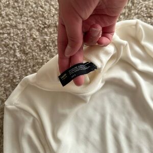 Finnesse mini open back dress.